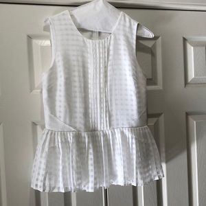 Sleeveless peplum top